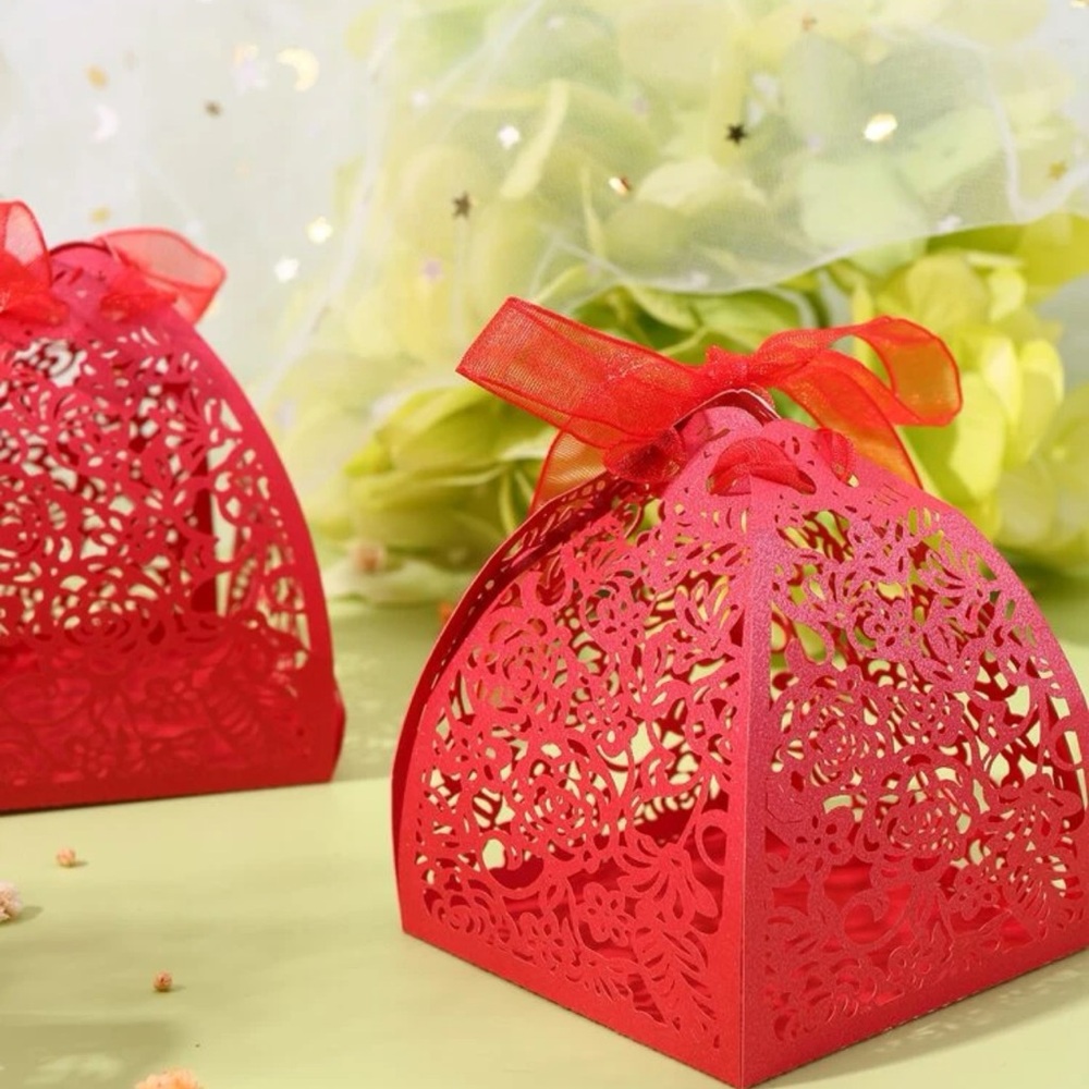 Foldable lace cut out craft boxes.